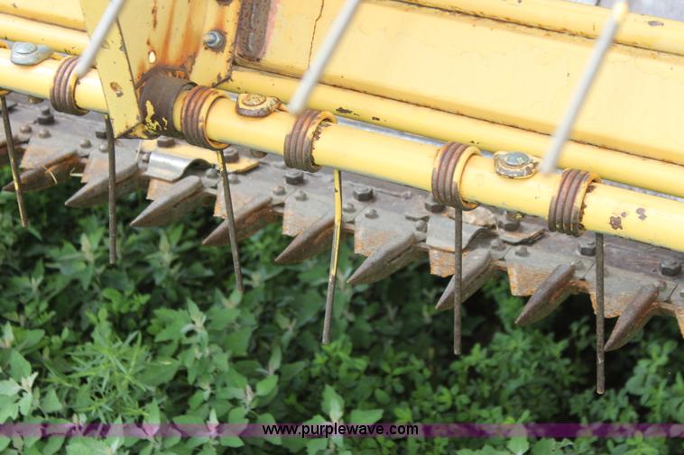 image for item G4058 1985 New Holland 1116 Speedrower self-propelled swather