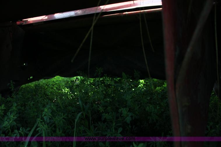 image for item G4058 1985 New Holland 1116 Speedrower self-propelled swather