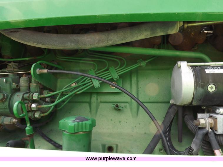 image for item I7683 1998 John Deere 4700 sprayer