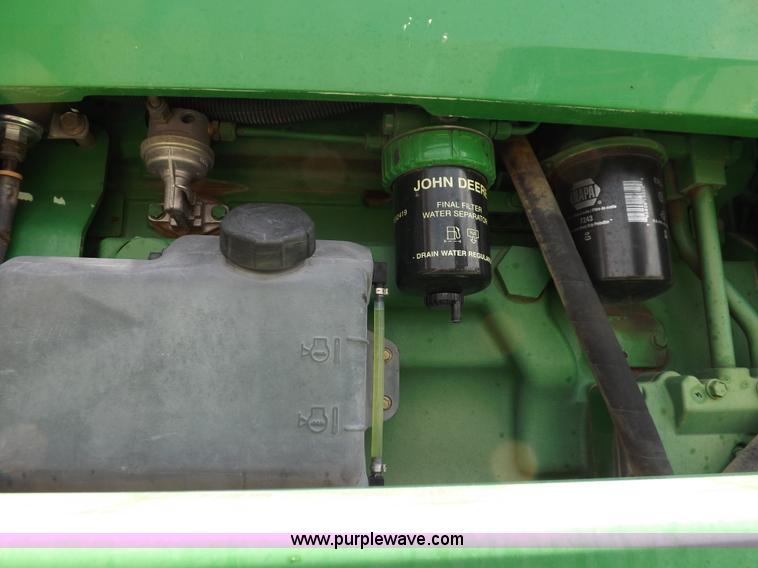 image for item I7683 1998 John Deere 4700 sprayer