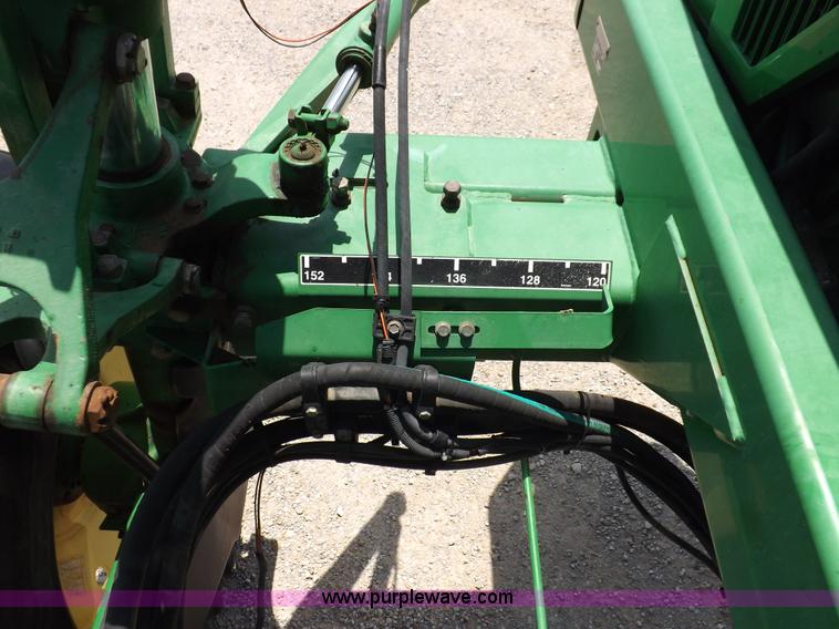 image for item I7683 1998 John Deere 4700 sprayer