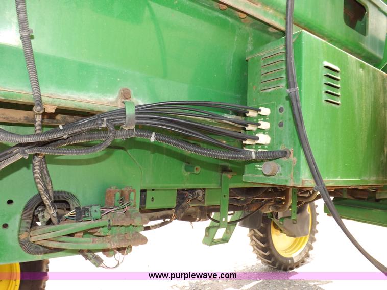 image for item I7683 1998 John Deere 4700 sprayer