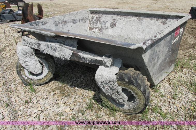 image for item AC9439 Skid steer hopper bucket with tires