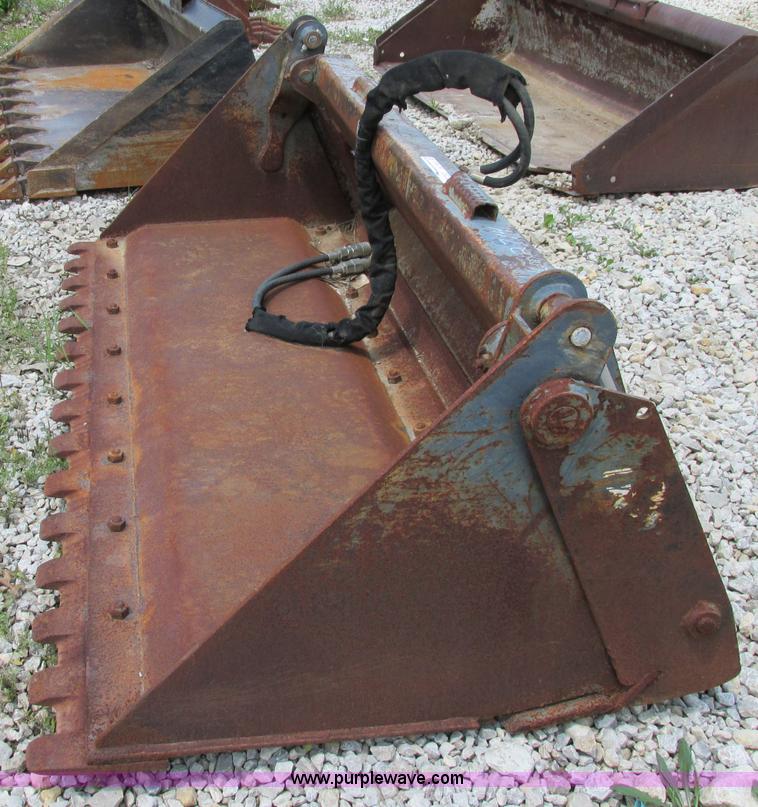 image for item AC9441 Case 72"W combination skid steer bucket