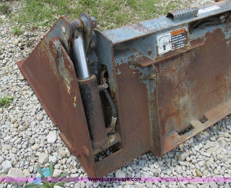 image for item AC9441 Case 72"W combination skid steer bucket