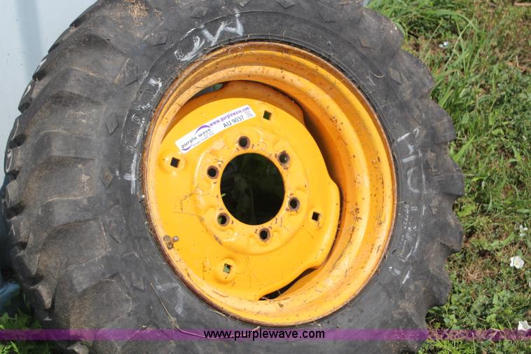 image for item AU9037 10-16.5 skid steer tire and wheel