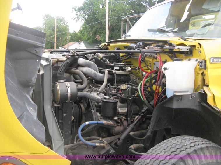 image for item D8462 1995 Ford F700 digger derrick truck