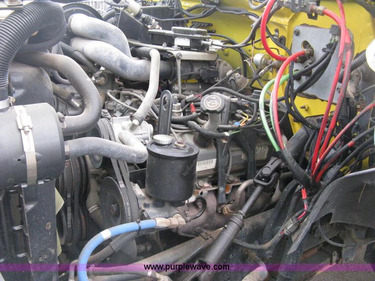 image for item D8462 1995 Ford F700 digger derrick truck