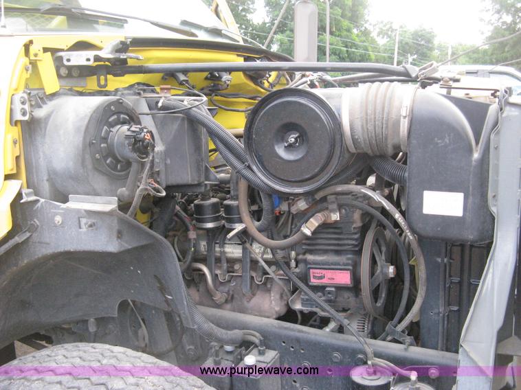 image for item D8462 1995 Ford F700 digger derrick truck