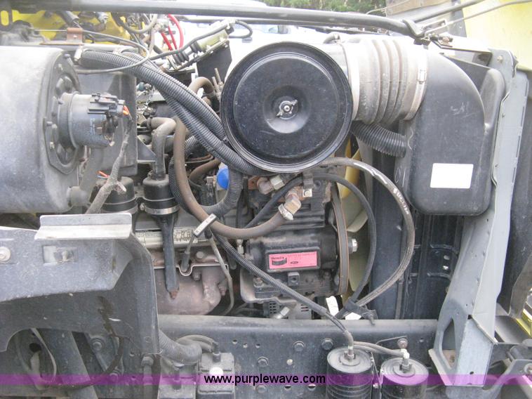 image for item D8462 1995 Ford F700 digger derrick truck