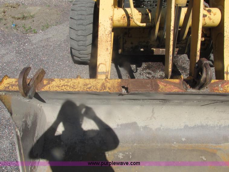 image for item E7307 1999 John Deere 310E backhoe