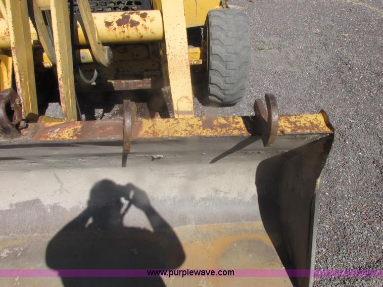 image for item E7307 1999 John Deere 310E backhoe