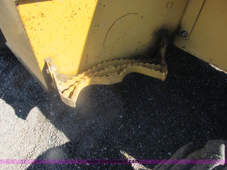 image for item E7307 1999 John Deere 310E backhoe