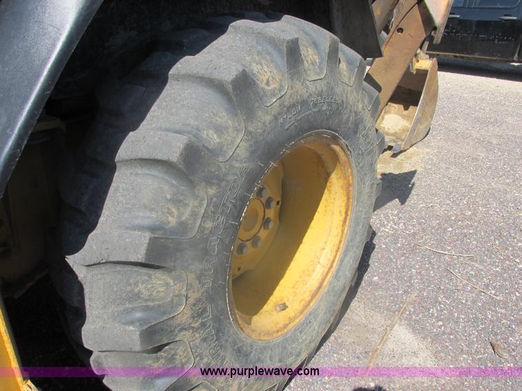 image for item E7307 1999 John Deere 310E backhoe