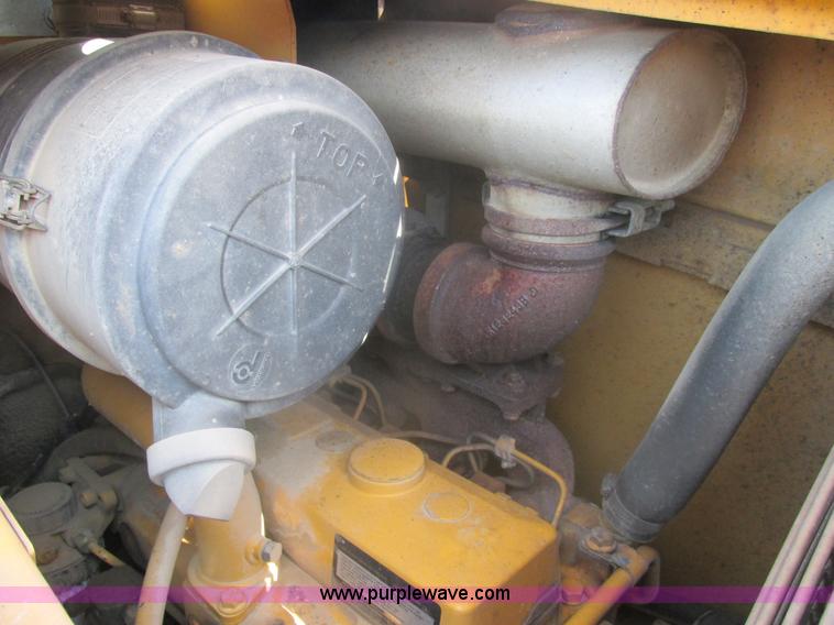 image for item E7307 1999 John Deere 310E backhoe