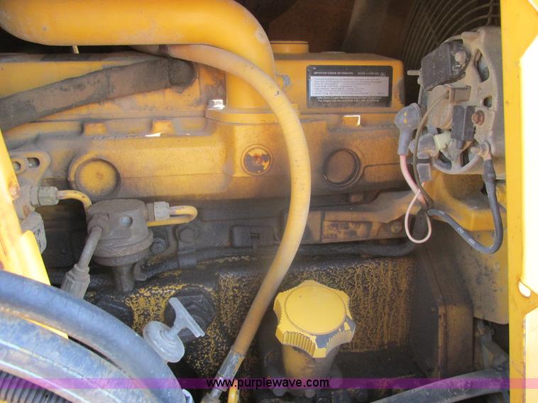 image for item E7307 1999 John Deere 310E backhoe