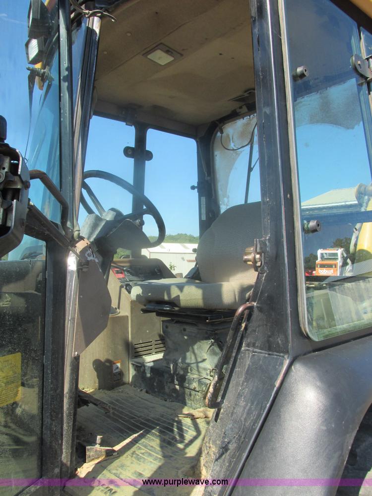 image for item E7307 1999 John Deere 310E backhoe