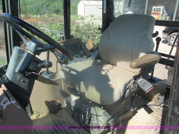 image for item E7307 1999 John Deere 310E backhoe