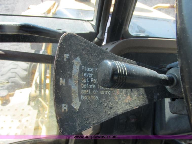 image for item E7307 1999 John Deere 310E backhoe