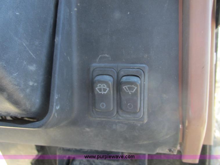 image for item E7307 1999 John Deere 310E backhoe