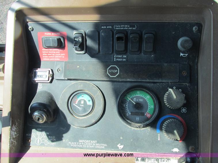 image for item E7307 1999 John Deere 310E backhoe