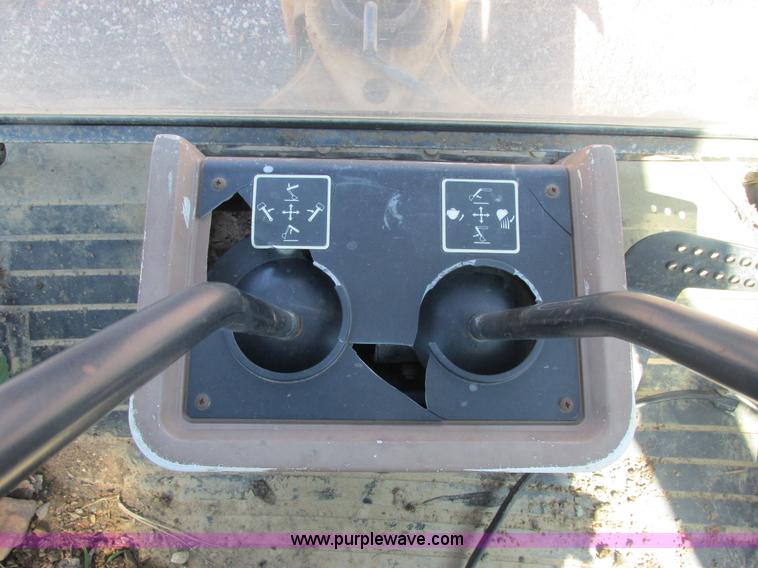 image for item E7307 1999 John Deere 310E backhoe