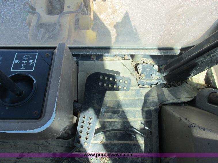 image for item E7307 1999 John Deere 310E backhoe