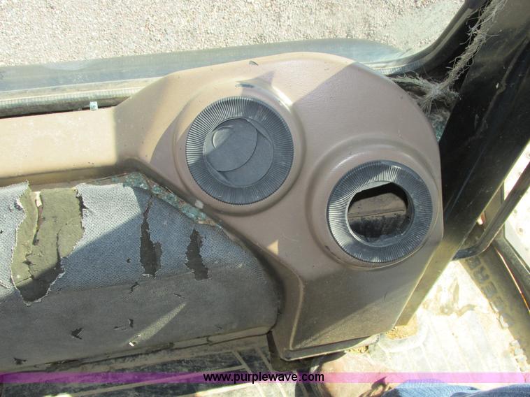 image for item E7307 1999 John Deere 310E backhoe