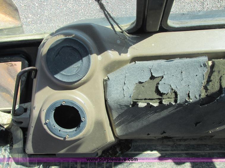 image for item E7307 1999 John Deere 310E backhoe