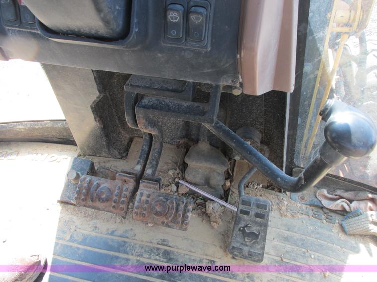 image for item E7307 1999 John Deere 310E backhoe