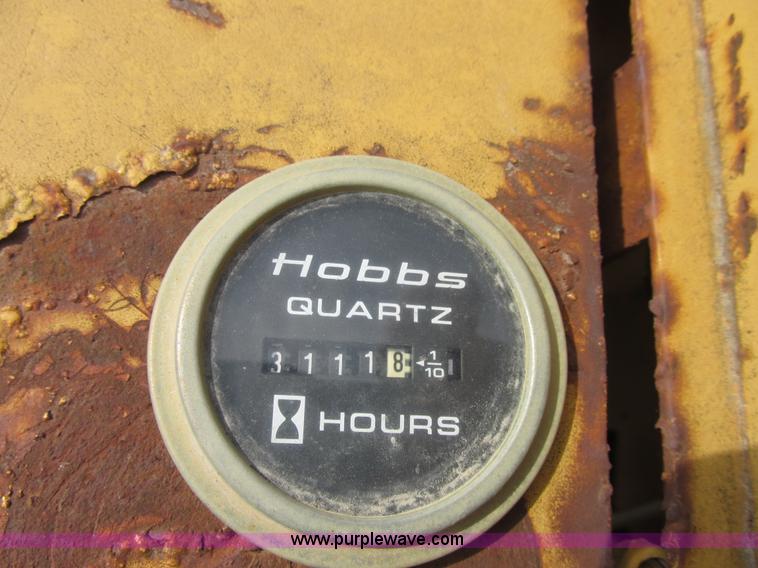 image for item E7320 1974 Caterpillar 815 compactor