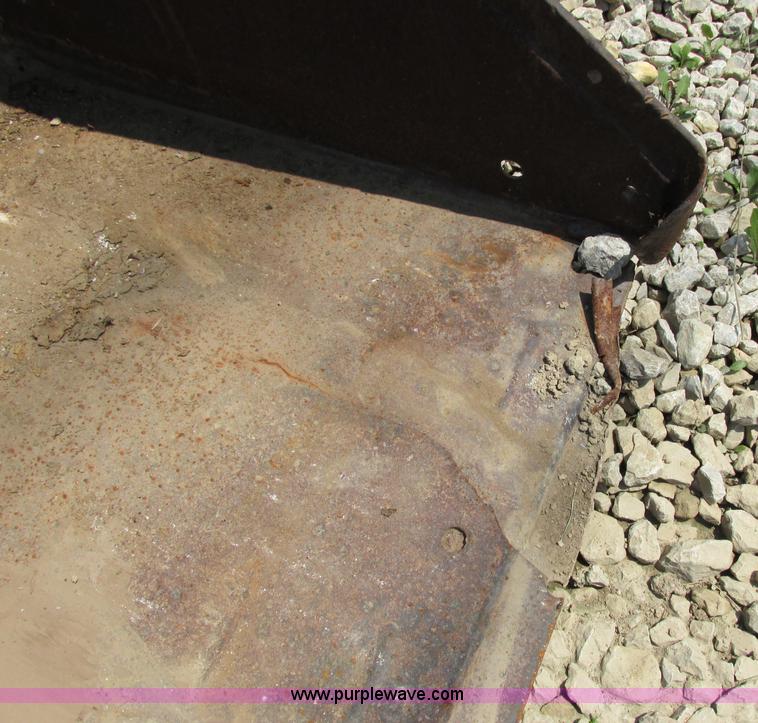 image for item F5186 74" skid steer bucket