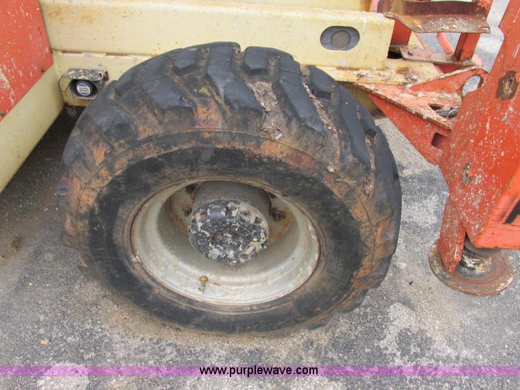 image for item F5189 2002 JLG 500RTS rough terrain scissor lift