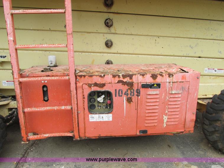 image for item F5189 2002 JLG 500RTS rough terrain scissor lift