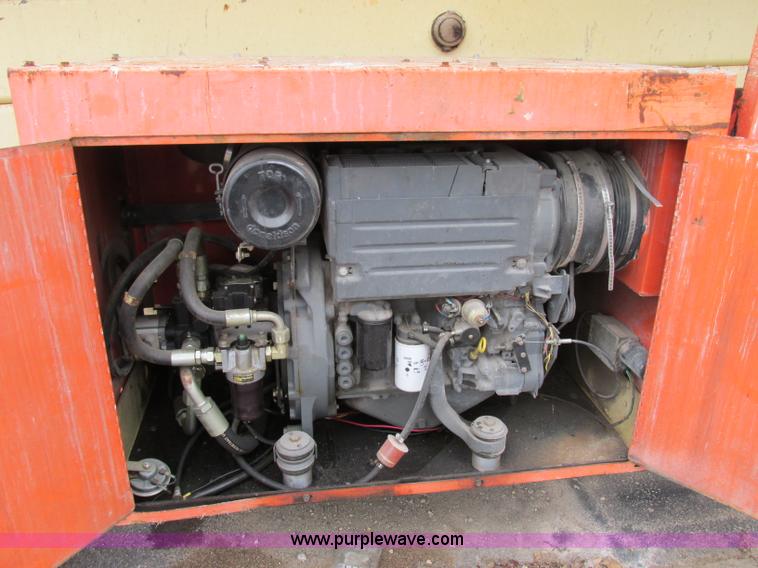 image for item F5189 2002 JLG 500RTS rough terrain scissor lift