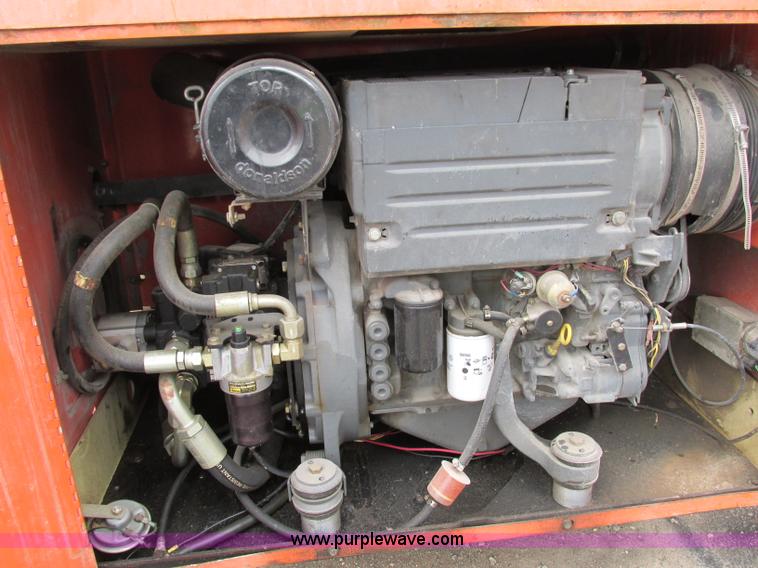 image for item F5189 2002 JLG 500RTS rough terrain scissor lift