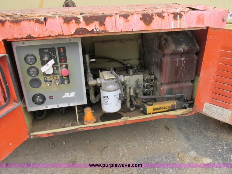 image for item F5189 2002 JLG 500RTS rough terrain scissor lift