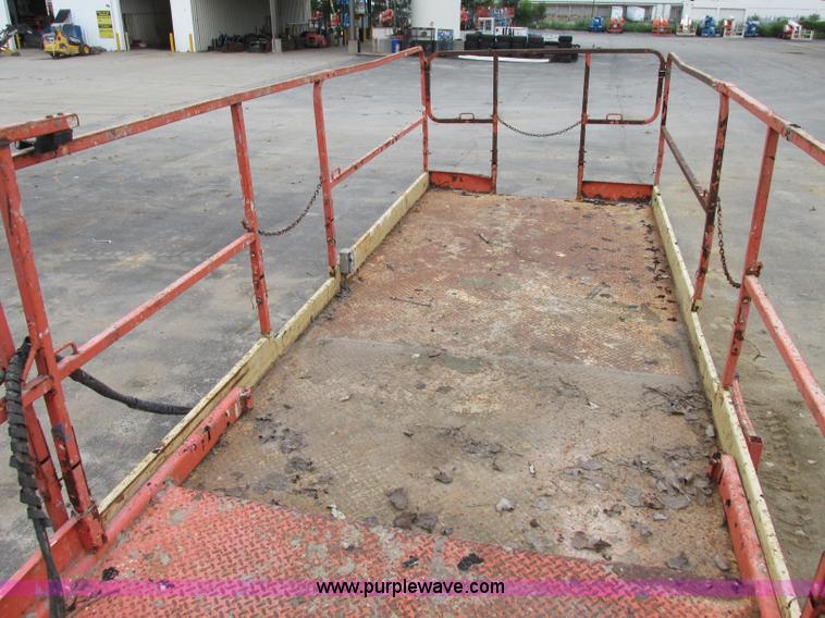 image for item F5189 2002 JLG 500RTS rough terrain scissor lift