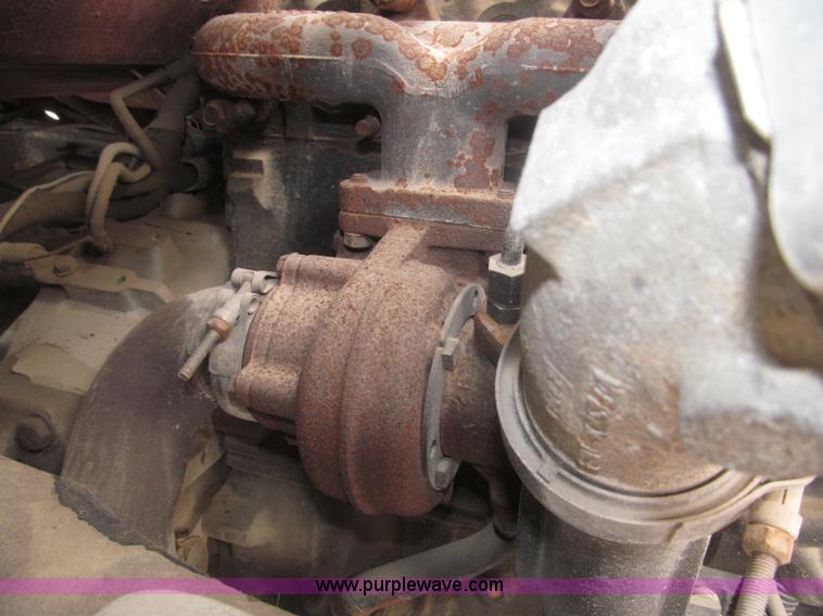 image for item F7066 1999 Ford F800 flatbed truck