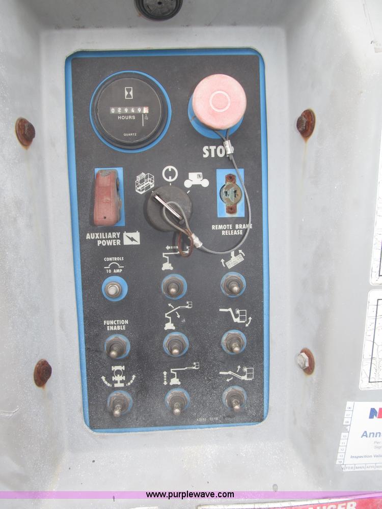 image for item F7076 1999 Genie Z34/22N narrow electric boom lift