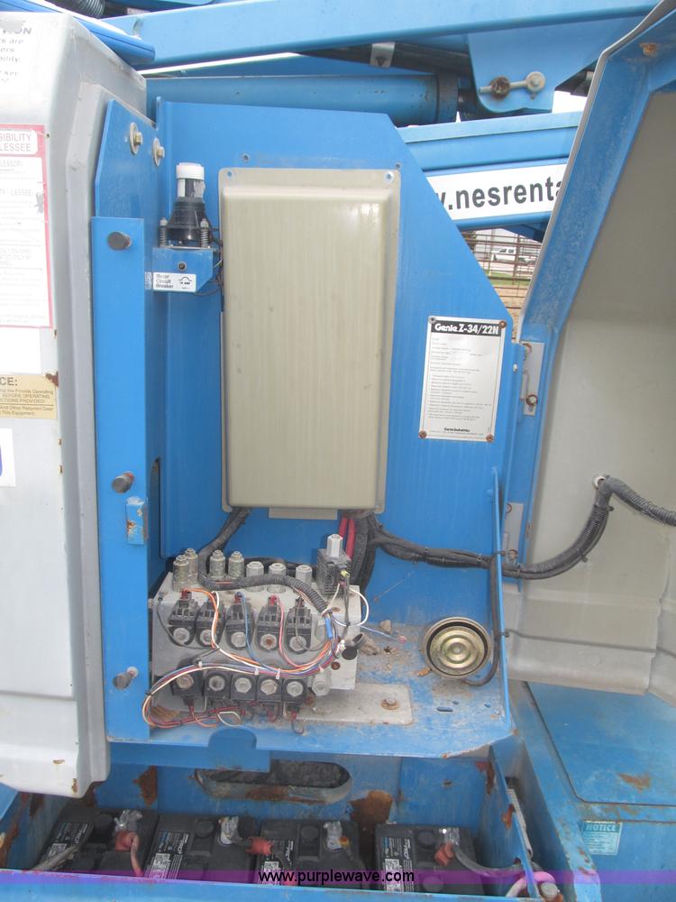 image for item F7076 1999 Genie Z34/22N narrow electric boom lift