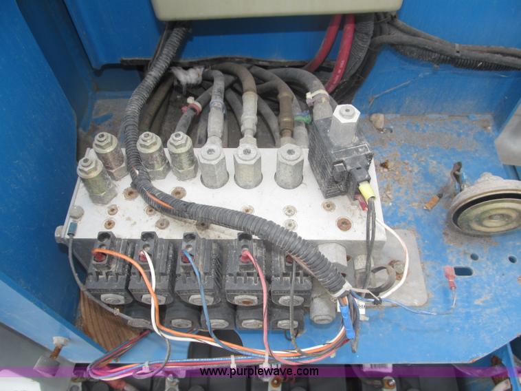 image for item F7076 1999 Genie Z34/22N narrow electric boom lift