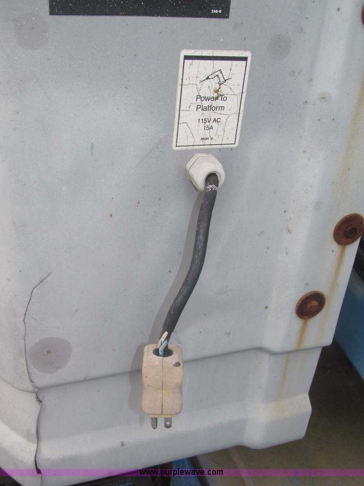 image for item F7076 1999 Genie Z34/22N narrow electric boom lift