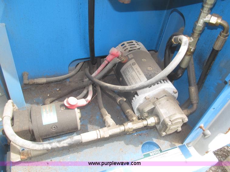 image for item F7076 1999 Genie Z34/22N narrow electric boom lift