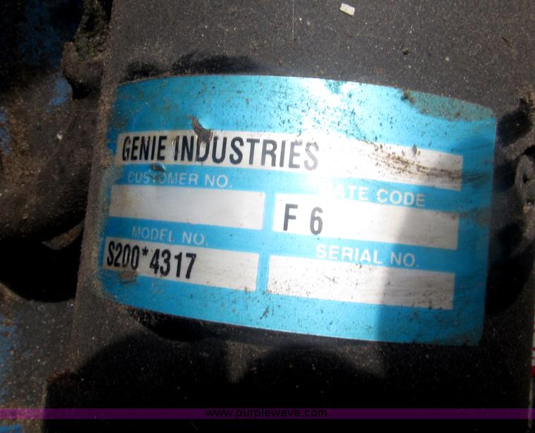 image for item F7076 1999 Genie Z34/22N narrow electric boom lift