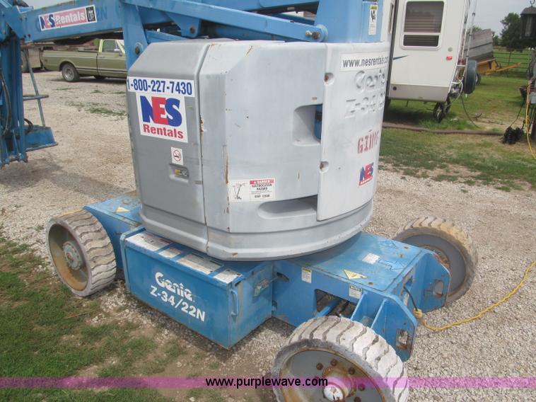 image for item F7076 1999 Genie Z34/22N narrow electric boom lift