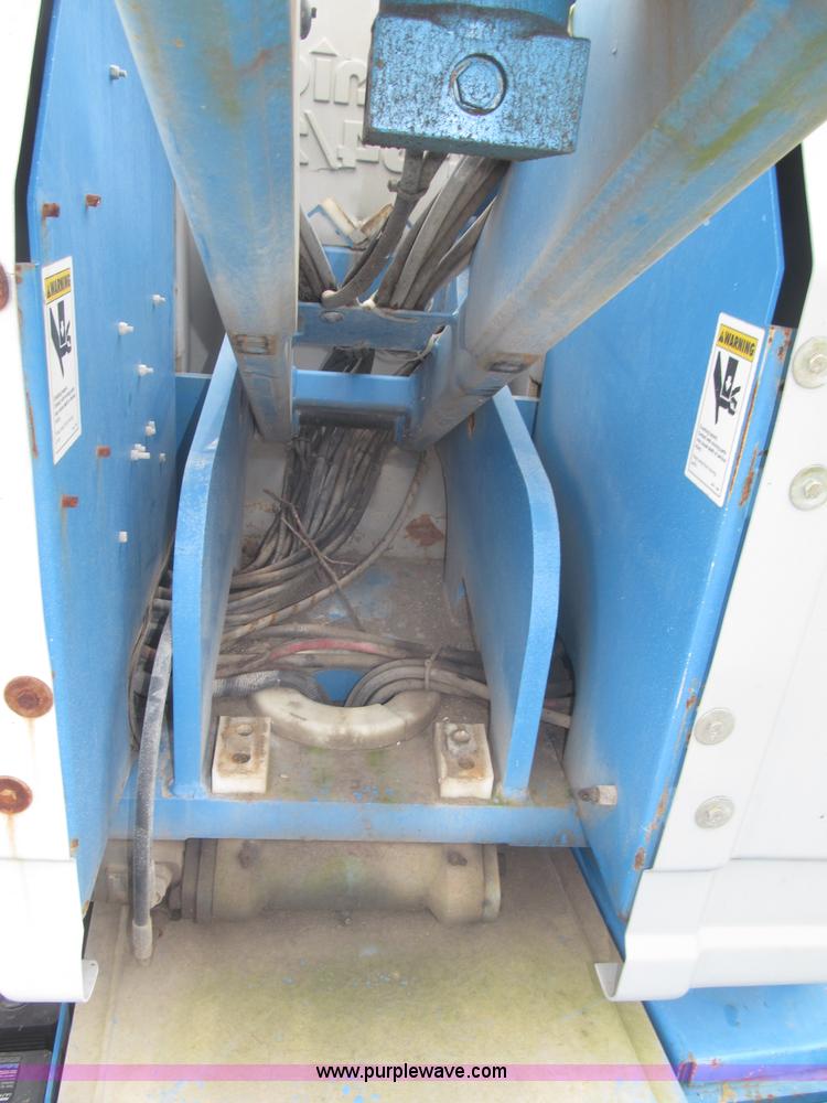 image for item F7076 1999 Genie Z34/22N narrow electric boom lift