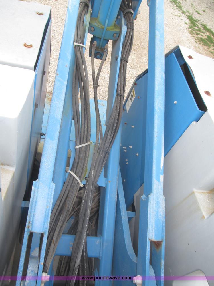 image for item F7076 1999 Genie Z34/22N narrow electric boom lift