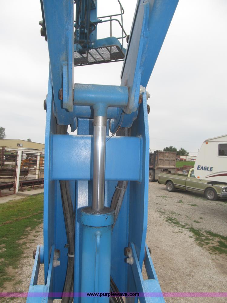image for item F7076 1999 Genie Z34/22N narrow electric boom lift