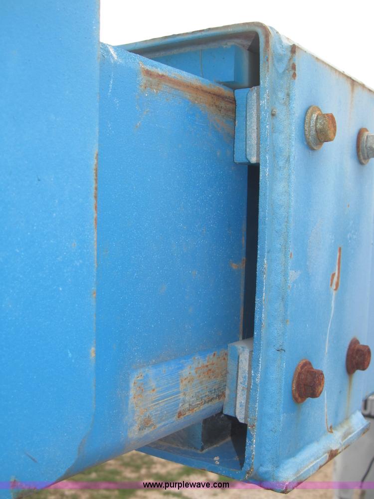 image for item F7076 1999 Genie Z34/22N narrow electric boom lift